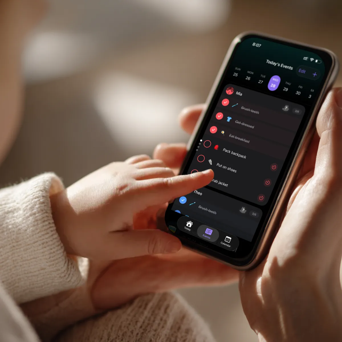 Family using ReadySet together - parents and children collaborating on morning routines